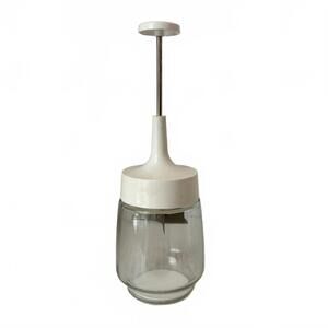 White Vintage Gemco glass nut chopper with white plastic lid and plunger.